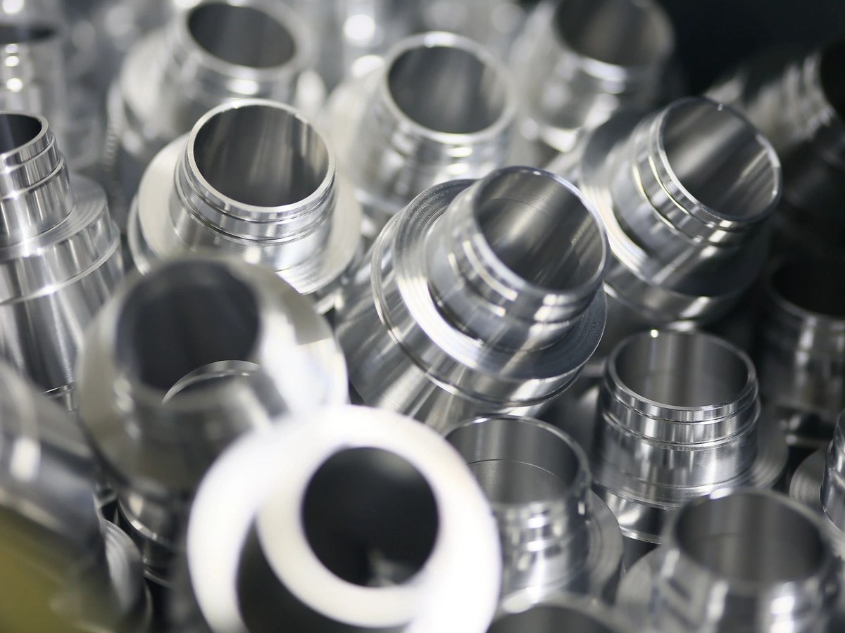 CNC turned aluminium sleeve components for EV systems